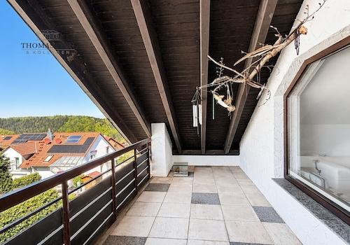 überdachter Balkon Wohnzimmer