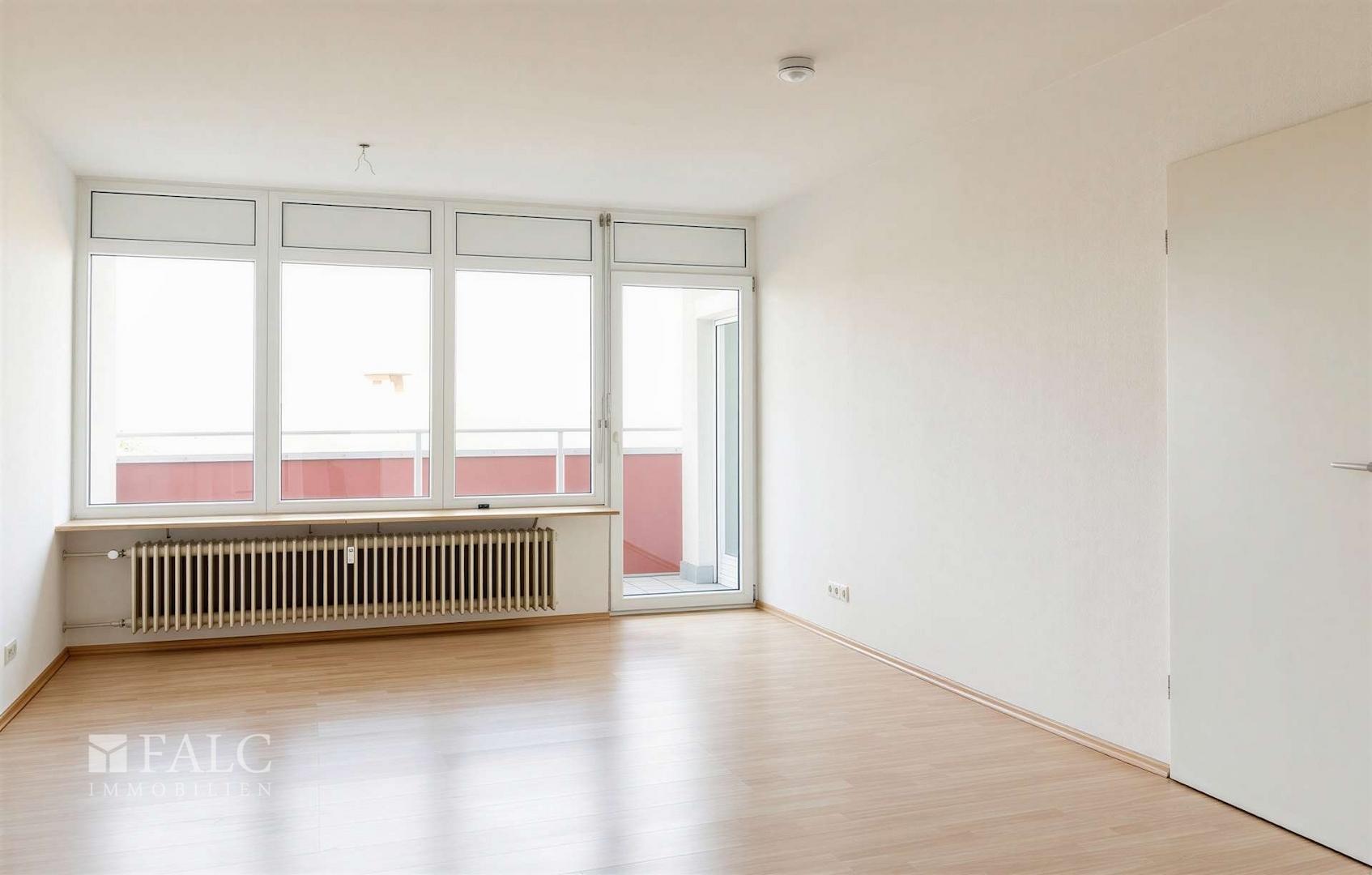 Wohnzimmer mit direktem Balkonzugang