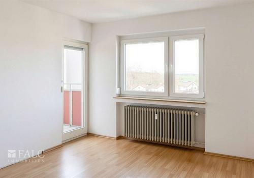 Schlafzimmer mit Balkonzugang