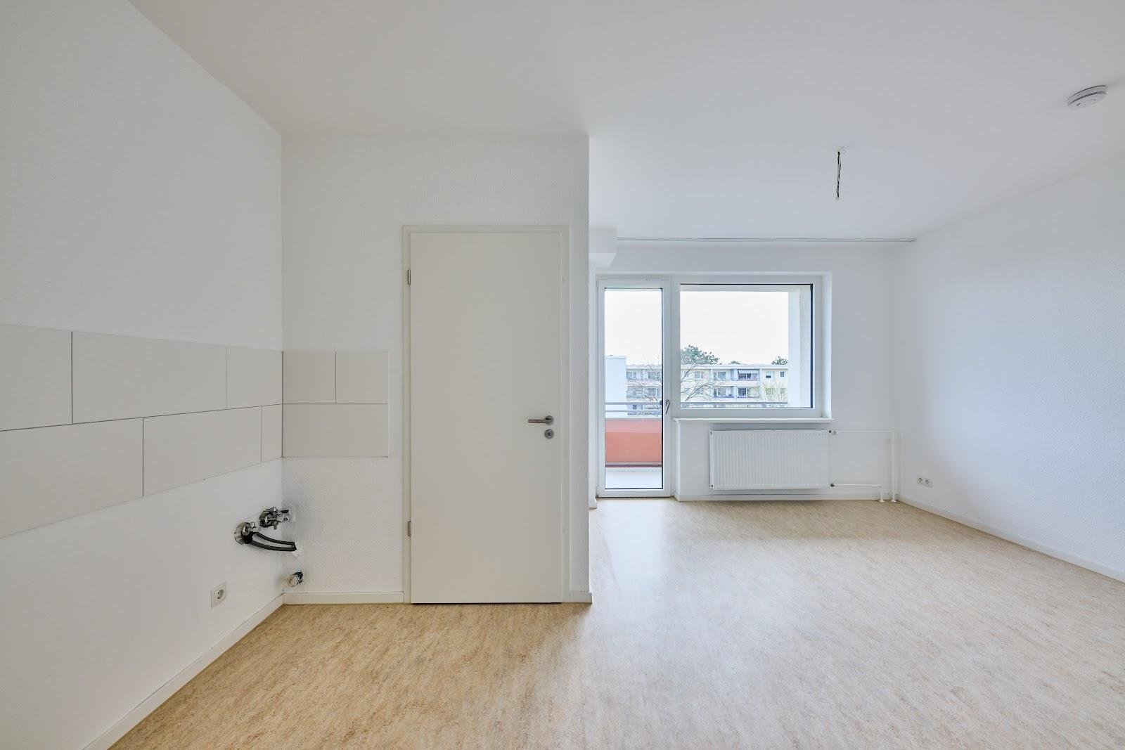Studio-Zimmer mit offenem Küchenbereich
