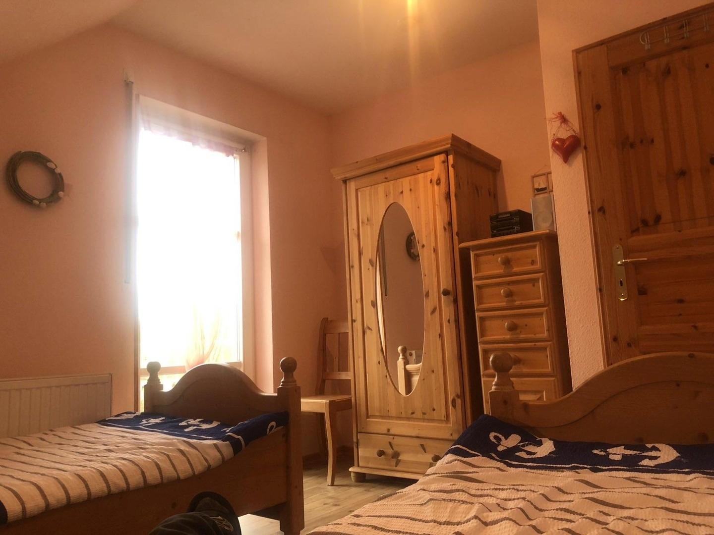 Schlafzimmer mit Balkonzugang