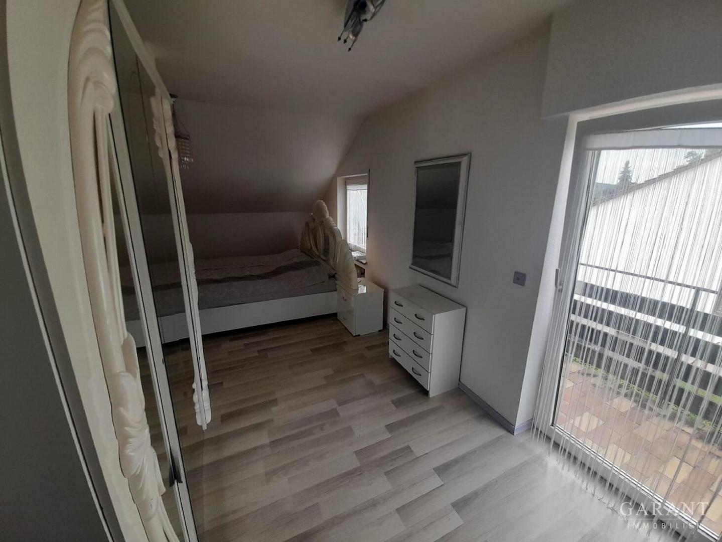 Zimmer mit Balkon