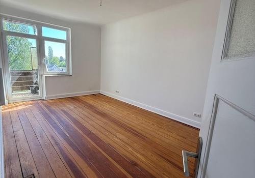Schlafzimmer mit Balkonzugang
