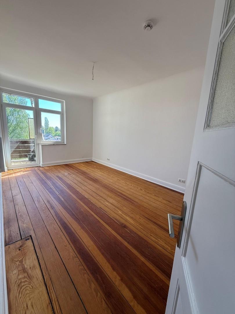 Schlafzimmer mit Balkonzugang