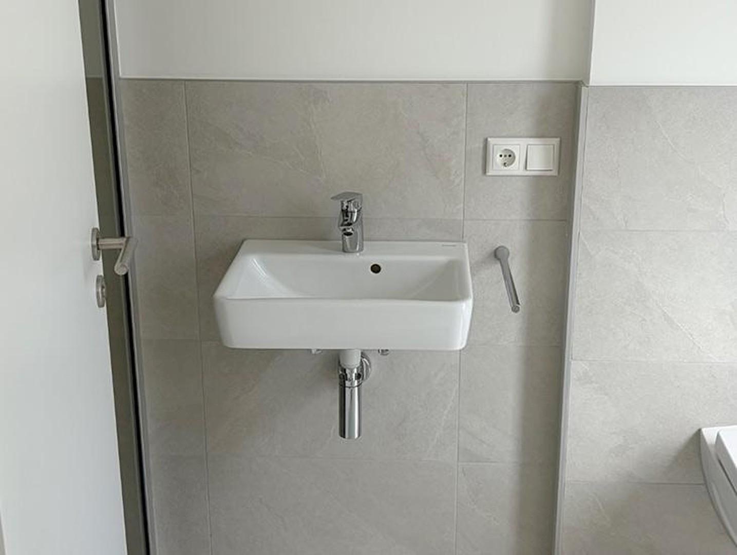 Duschbad mit Designsiphon