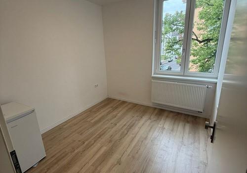Zimmer mit Kühlschrank