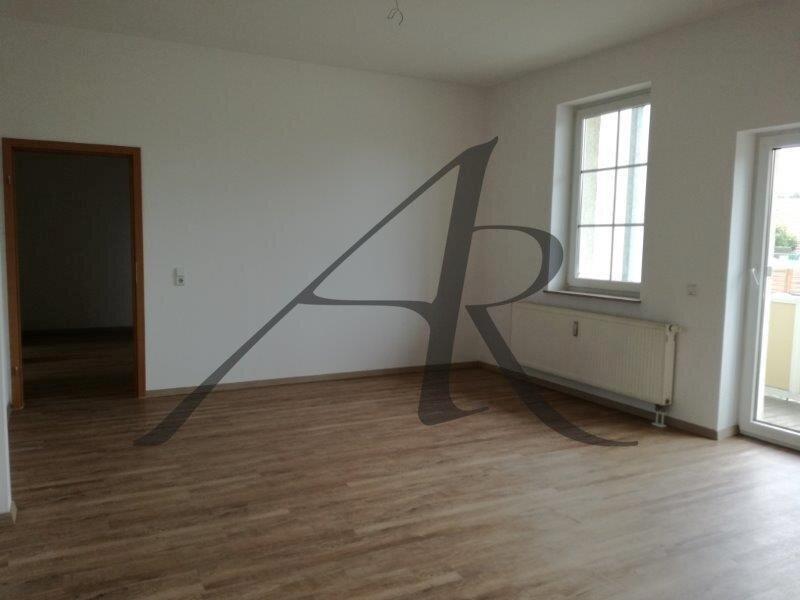 Wohnzimmer mit Balkon