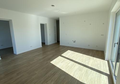 Zimmer mit Wohnküchenbereich