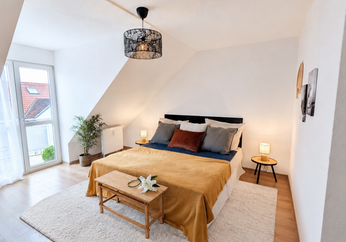 Schlafzimmer mit Balkon