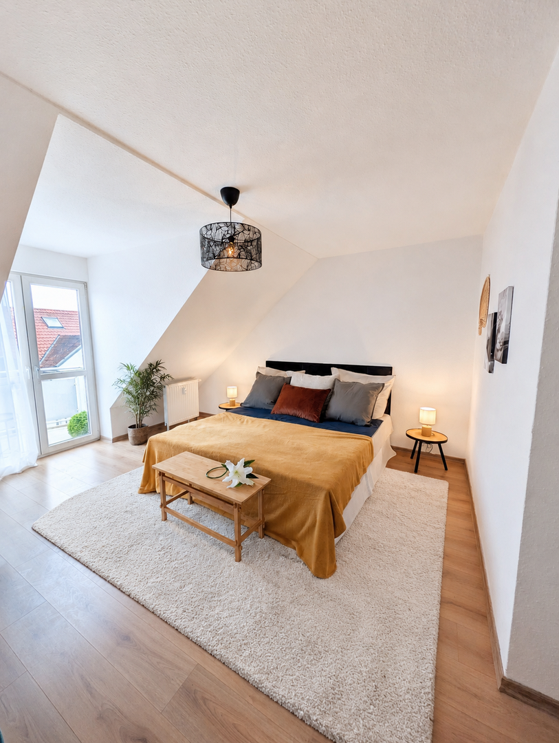 Schlafzimmer mit Balkon