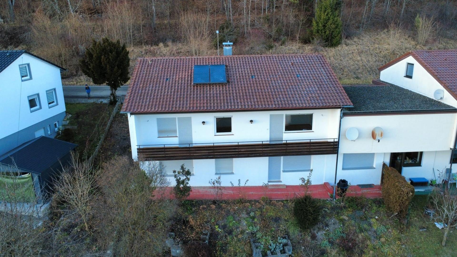 Rückseite mit einem Gartenteil
