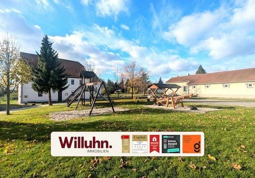 Hausansicht vom Spielplatz aus