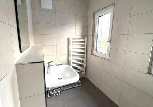 Bad mit bodentiefer Dusche