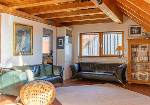 Wohnen über dem See – Charmante Maisonettewohnung mit Alpenpanorama