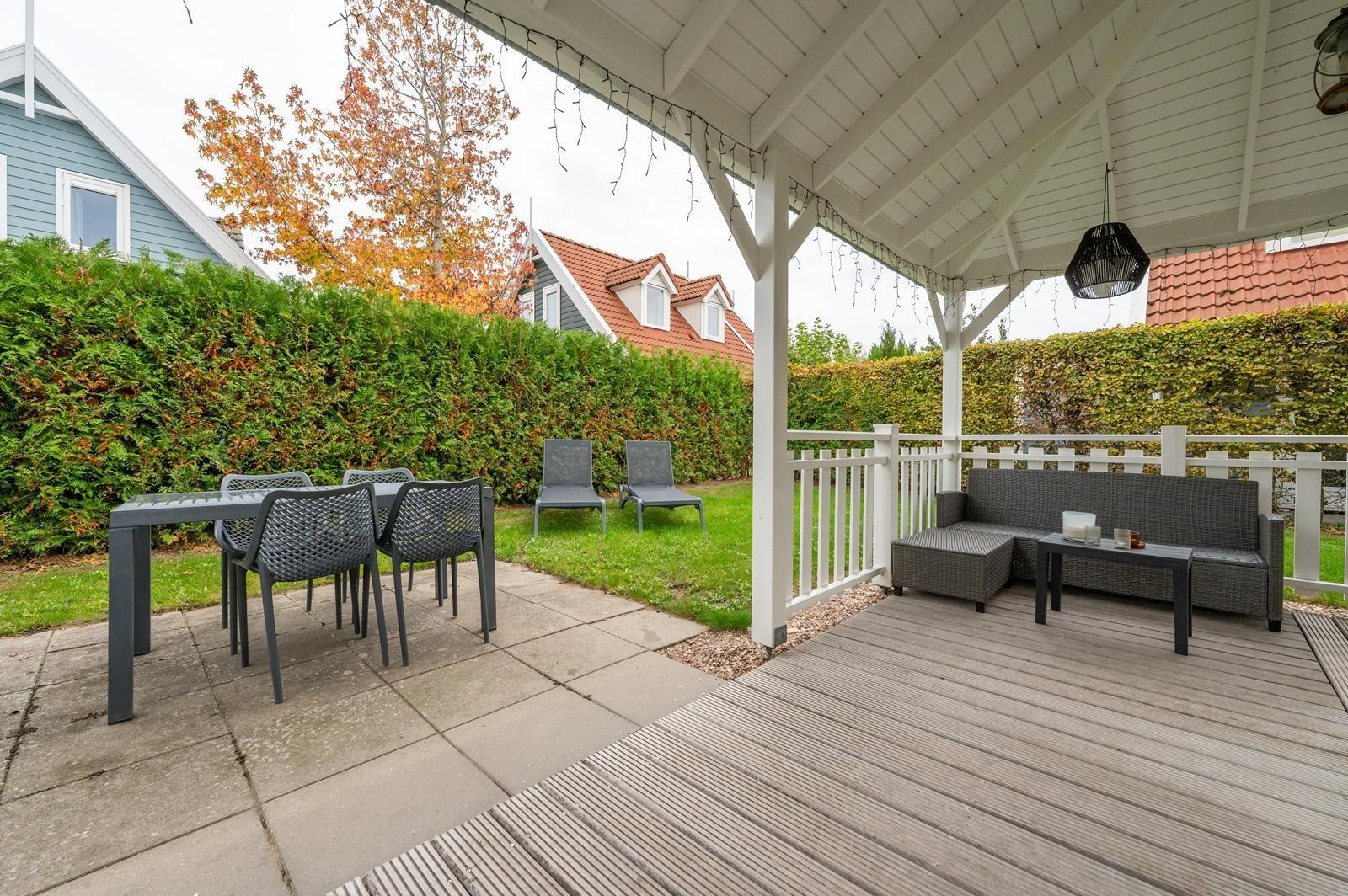 kaufen-freistehendes-ferienhaus-bruinisse-aussenansicht-garten-recreatieadviseurs-vakantiehuistekoop-nl.jpg16