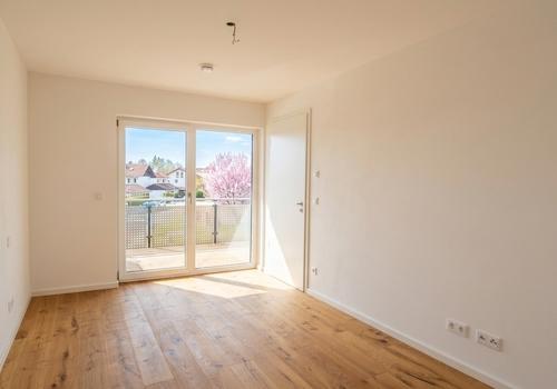 Schlafzimmer mit Balkonzugang