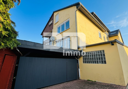 Seiten / Rückansicht / Zufahrt Carport