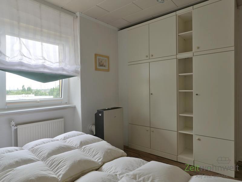 Klimagerät und Kleiderschrank