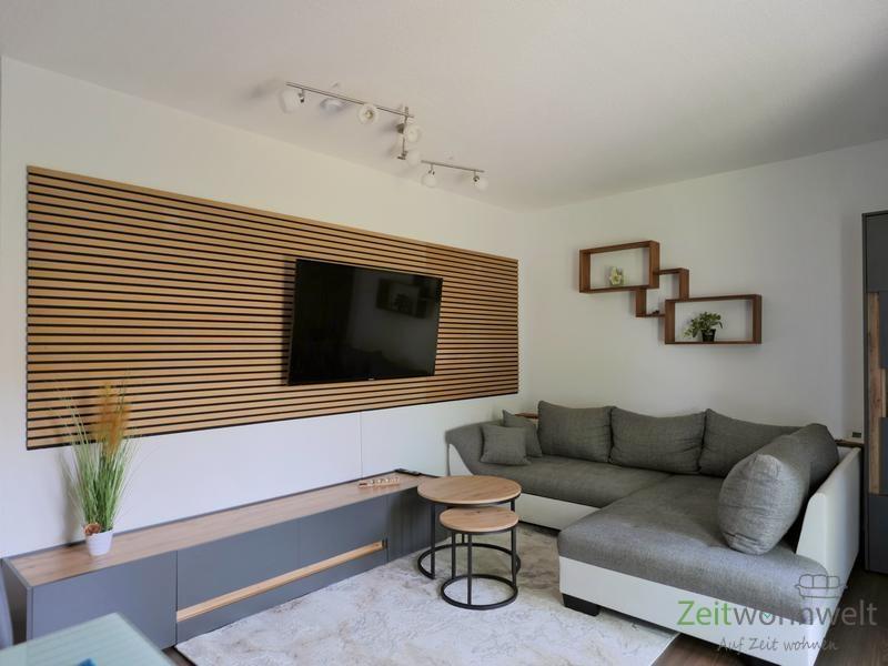Sitzecke, TV und Akkustikwand