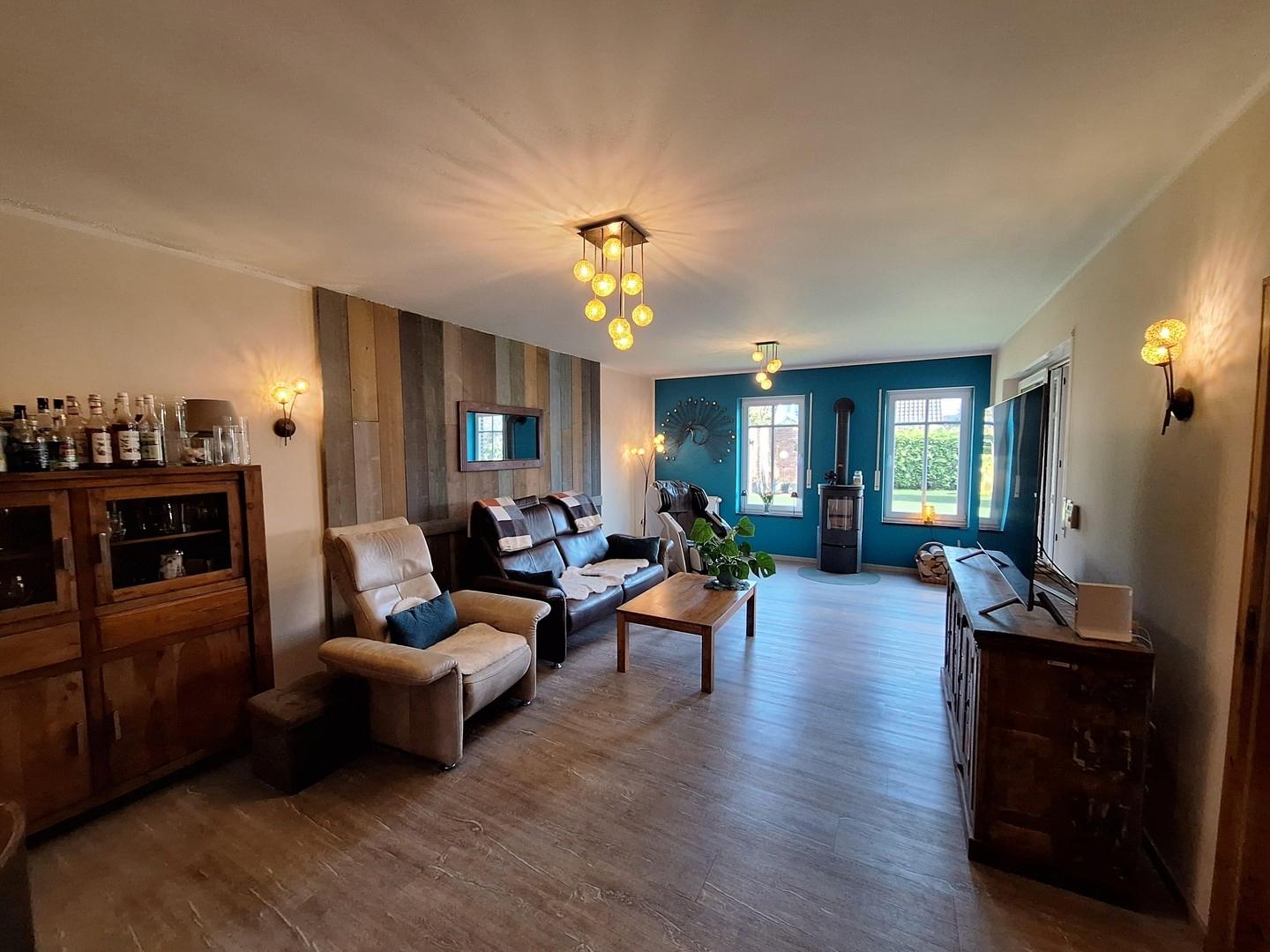 Wohnzimmer mit Kamin