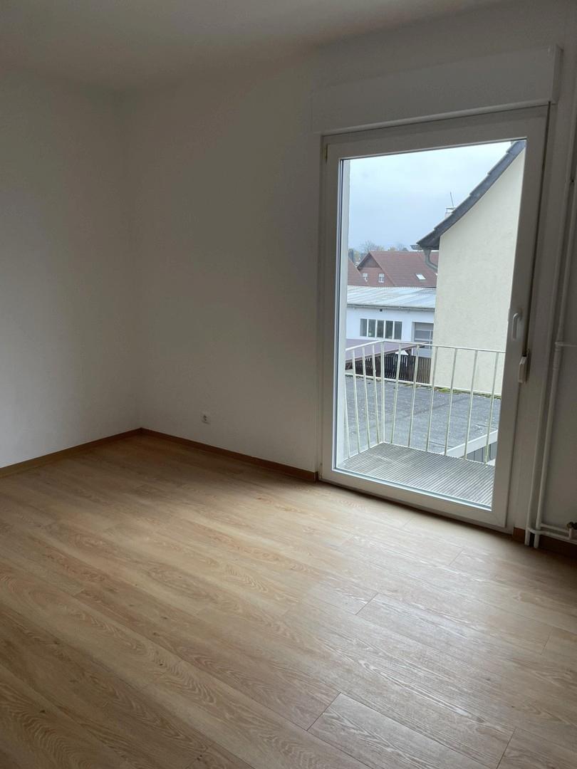 Schlafzimmer mit Balkon