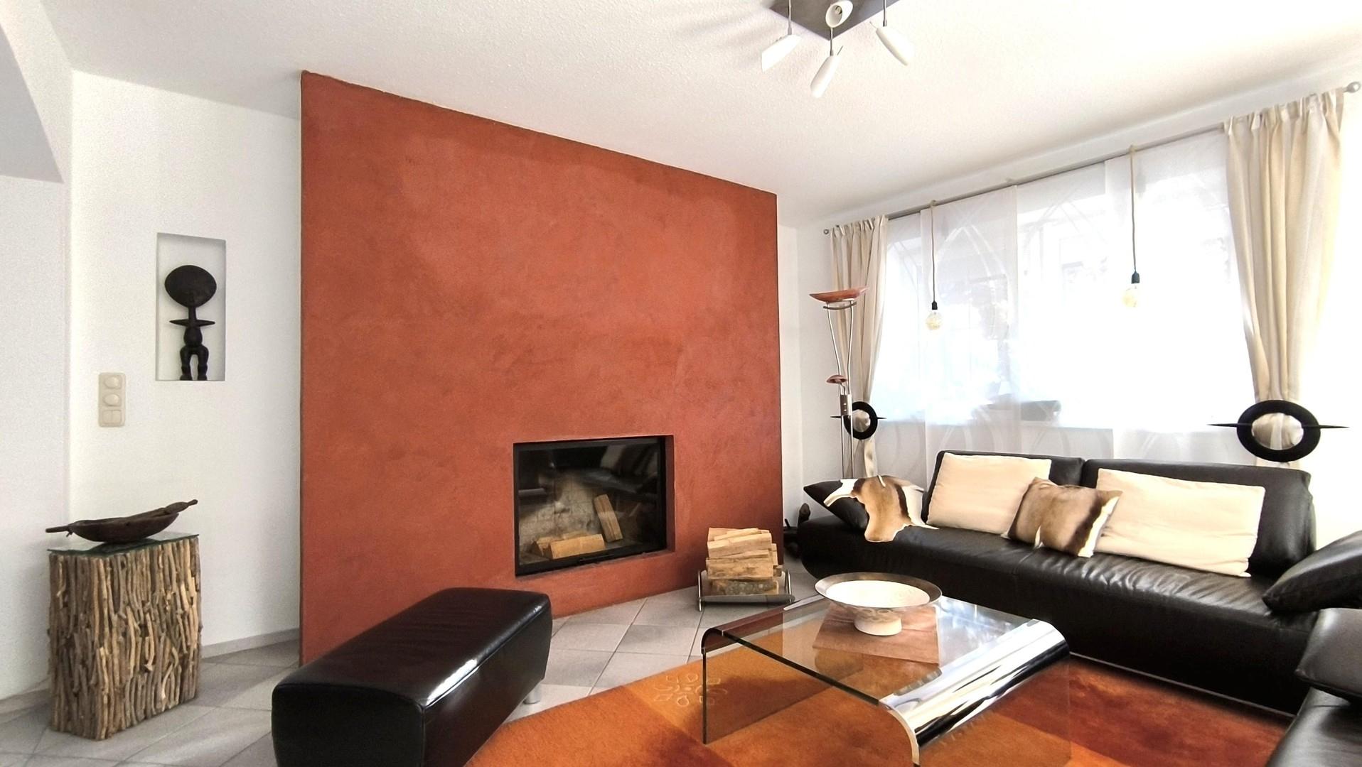 Wohnzimmer mit Feuerstelle 