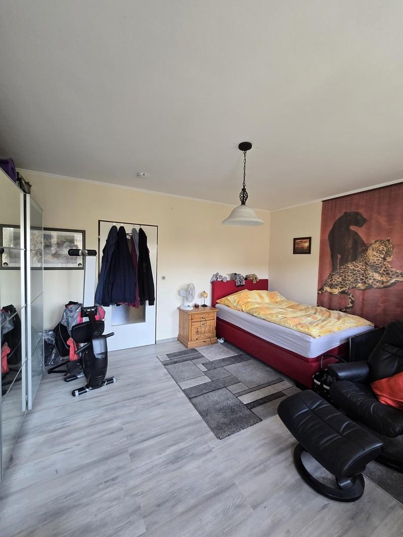 Schlafzimmer mit Balkon