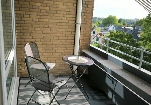 Balkon mit Markise