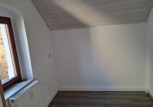 Küchenbereich mit anschließendem Esszimmer