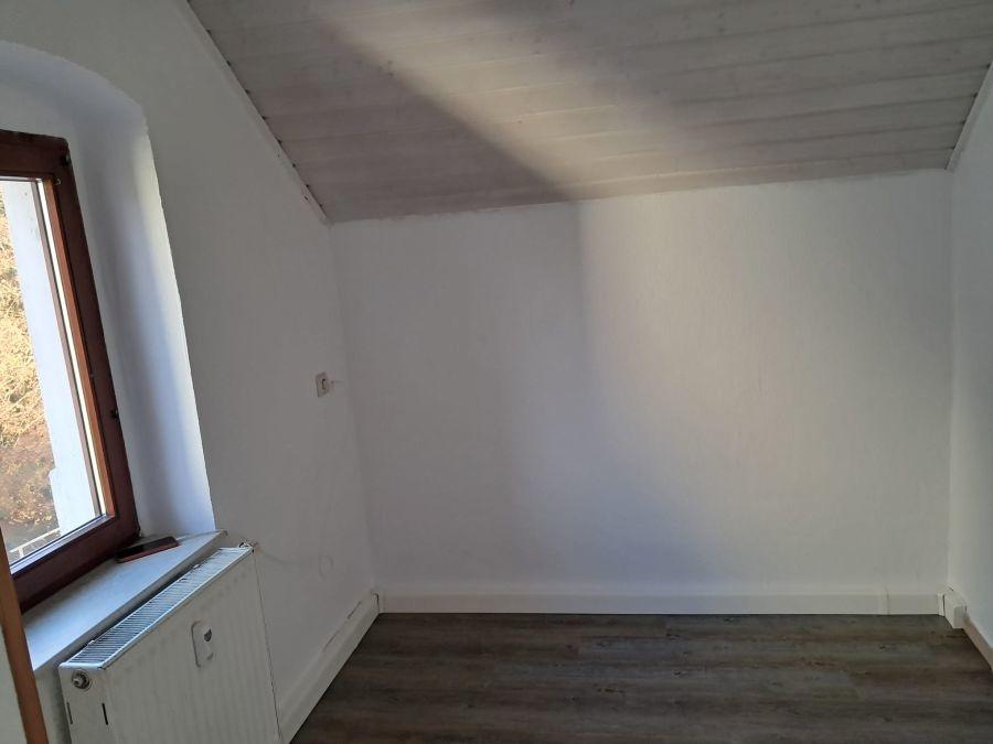 Küchenbereich mit anschließendem Esszimmer