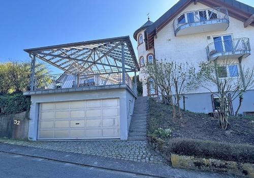 Doppelgarage und Carport