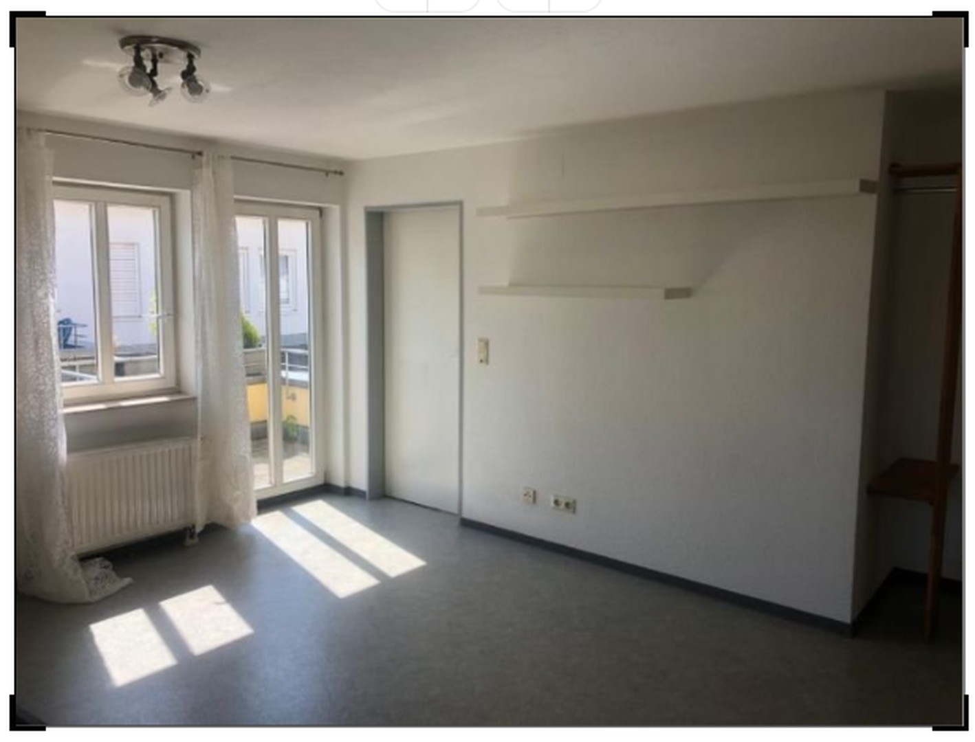 Wohn-/Esszimmer + Küche