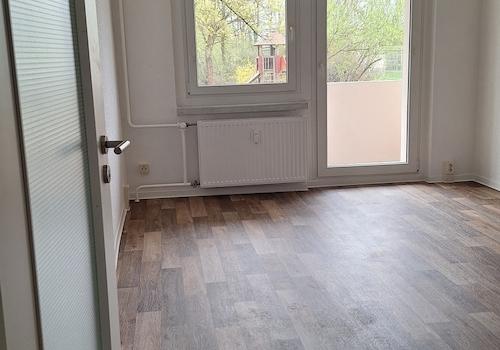 Wohnzimmer mit Balkon