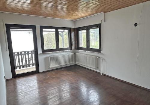OG Wohn- und Esszimmer mit Balkon