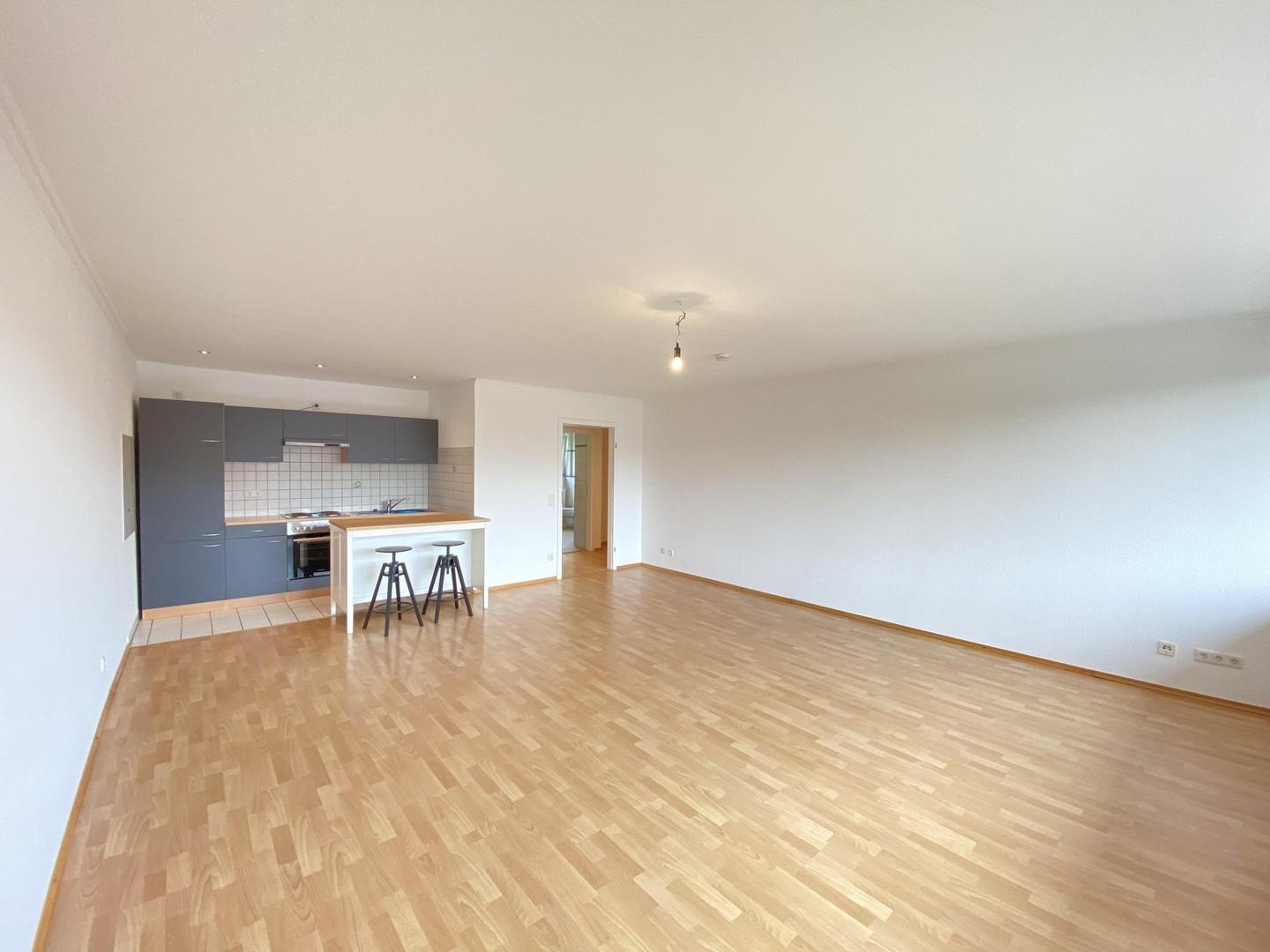 Wohnzimmer mit Küche