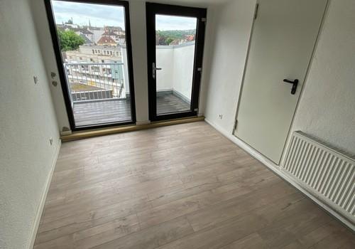 Zimmer mit Balkon