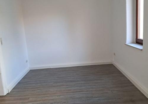 Esszimmer mit anschließendem Küchenbereich