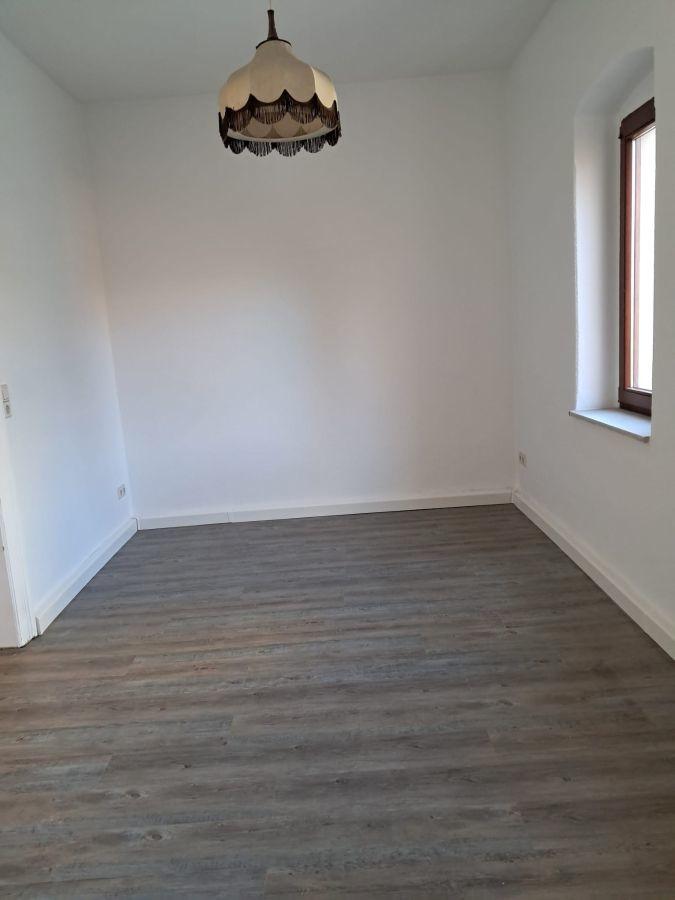 Esszimmer mit anschließendem Küchenbereich