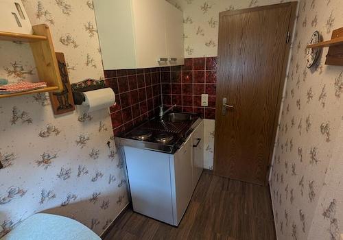 1. OG Küche B1 Gästezimmer 1