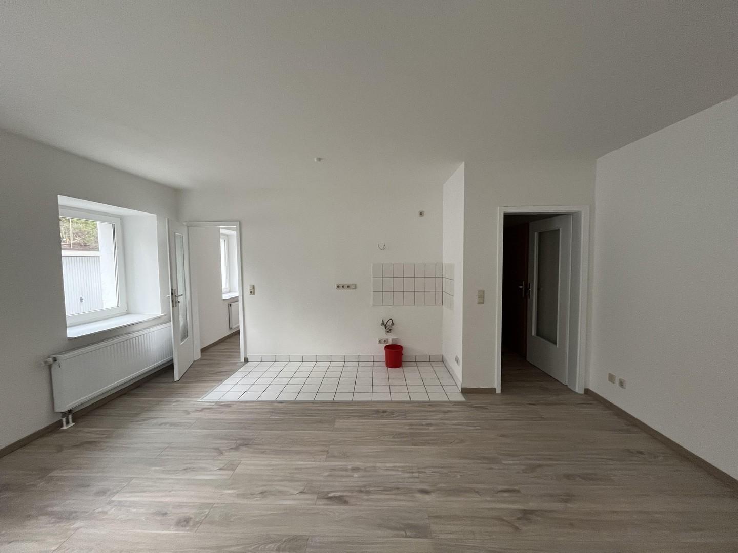 Wohnzimmer mit Küche