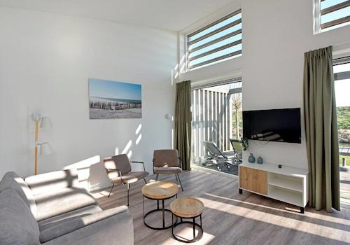 kaufen-freistehendes-ferienhaus-kamperland-sitzecke-wohnzimmer-recreatieadviseurs-vakantiehuistekoop-nl.jpg