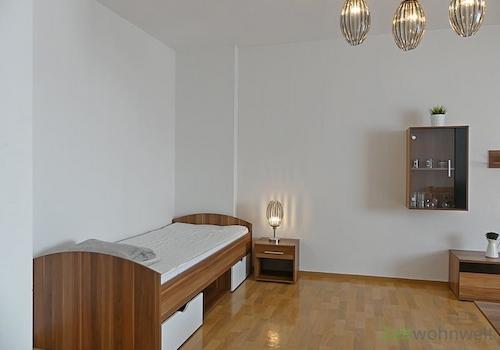 Bett imm Wohnzimmer