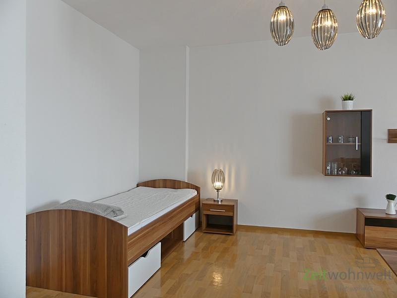 Bett imm Wohnzimmer
