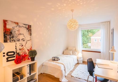 Schlafzimmer mit Balkon