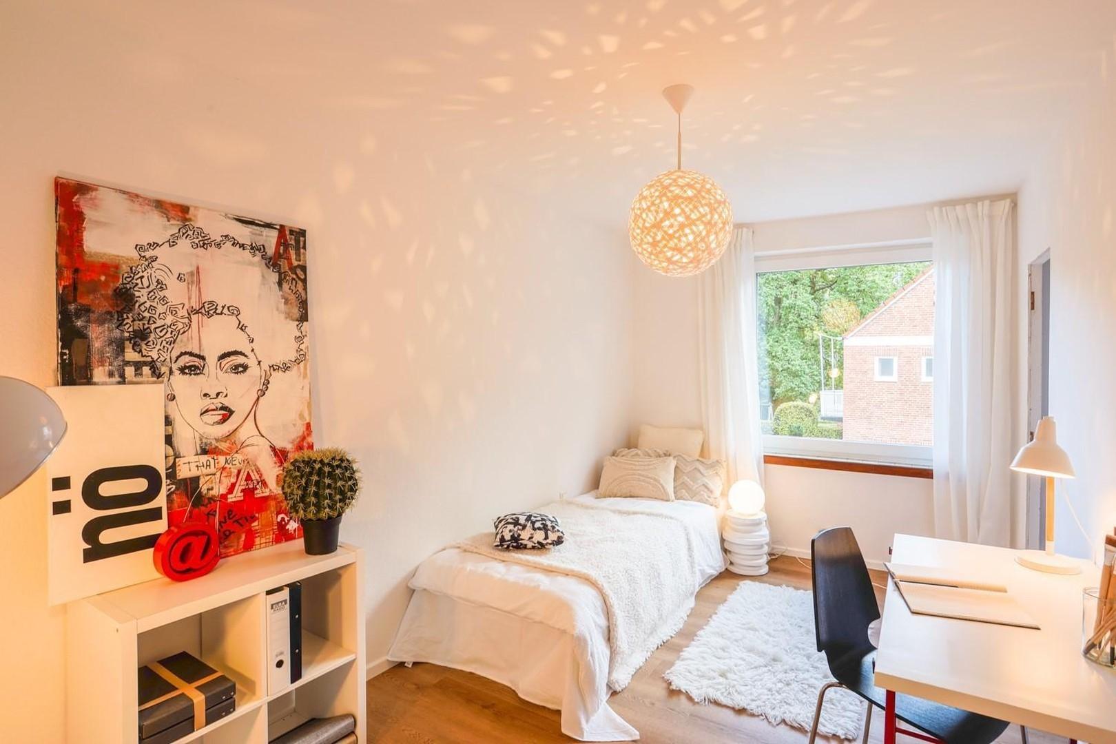 Schlafzimmer mit Balkon
