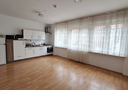 Wohnzimmer mit Küche