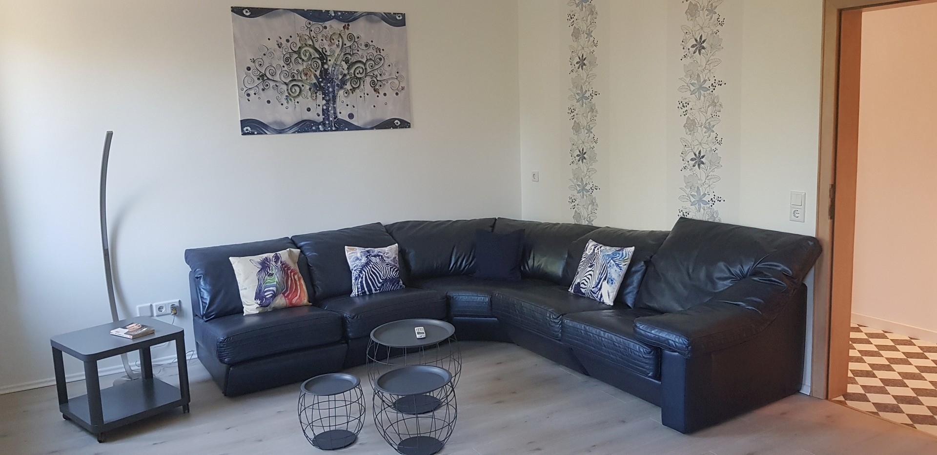 Wohnzimmer mit Designercouch