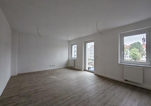Wohnzimmer mit Balkon