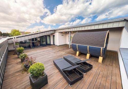 Dachterrasse + Fasssauna