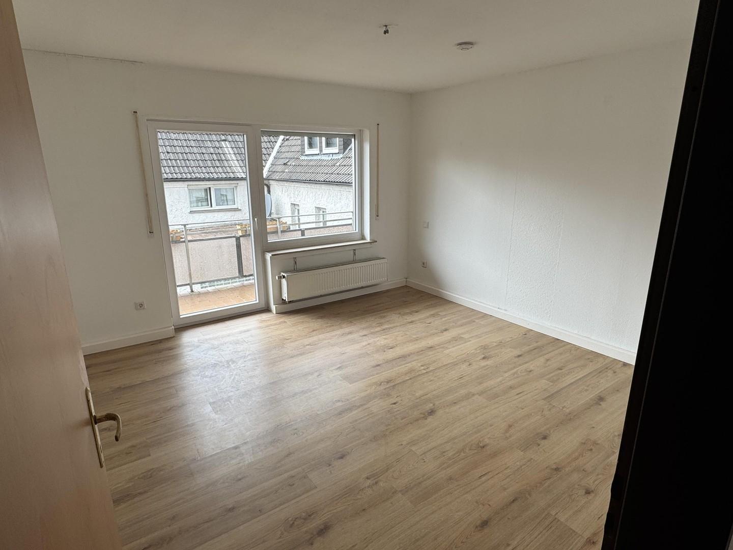 Zimmer mit Balkonzugang